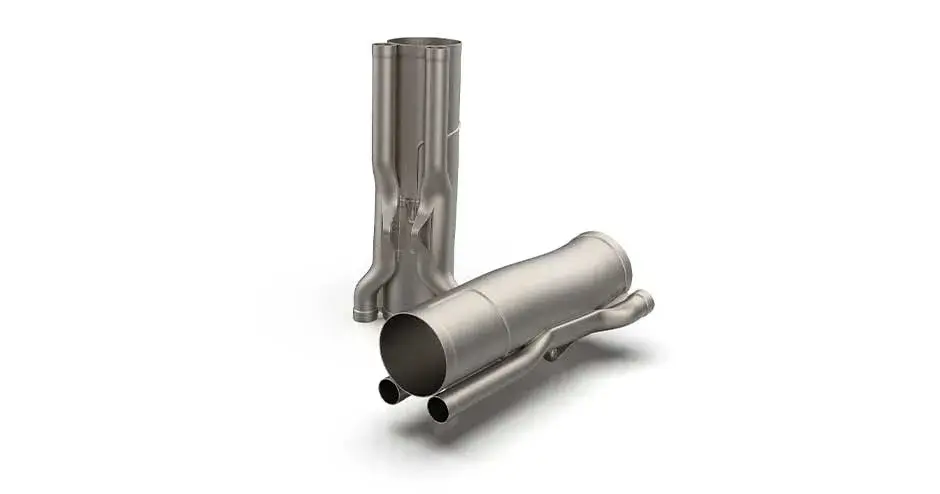 dmp laserform ti-gr23 (A) auspuff aufrecht im hintergrund und schräg davor liegend