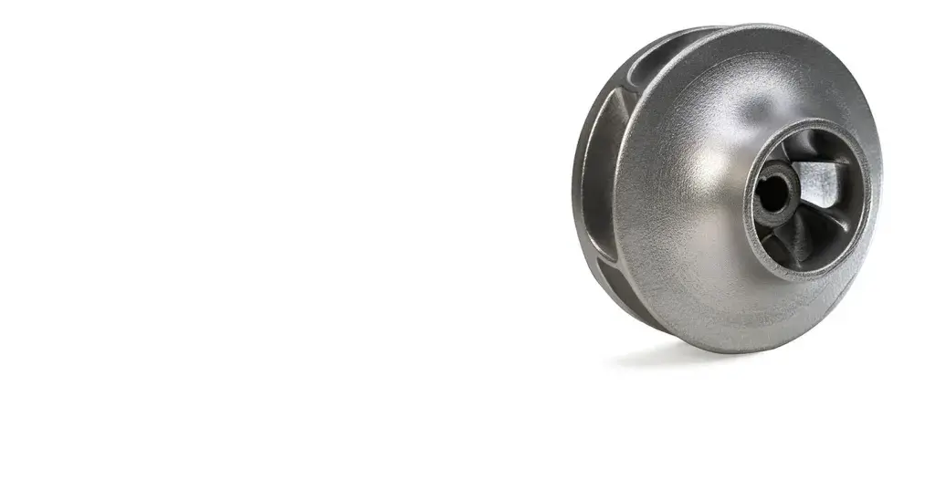 A DMP 3D Printed impeller sitting on it's side