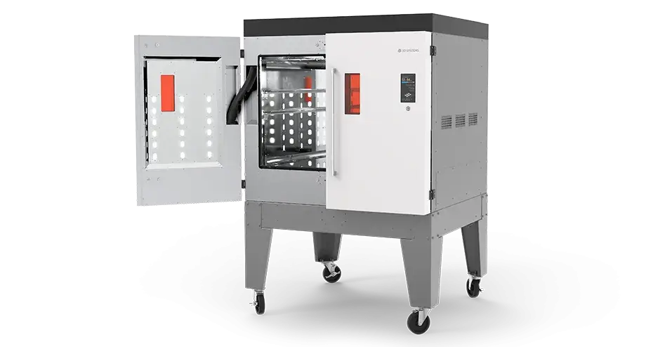 MDM-Nachbearbeitungsgerät mit offenem Türspalt, der Blick ins Innere des Geräts gewährt