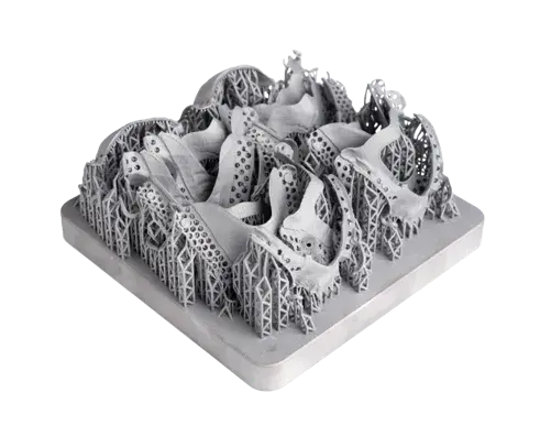 Mit DMP in 3D gedruckte zahntechnische Teile auf einem Tablett